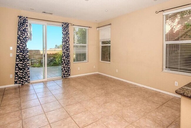 Building Photo - 13210 Petunia Avenue