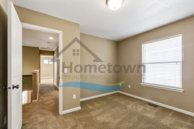 Building Photo - 3 Bedroom 3 Bathroom Home with Attached 2 Car Garage Available in Coeur d'Alene!