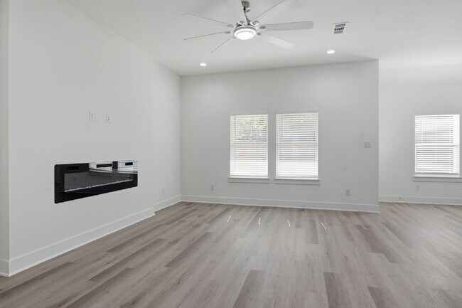 Building Photo - "New Construction 3-2-2 Home with Designer Touches Throughout!"