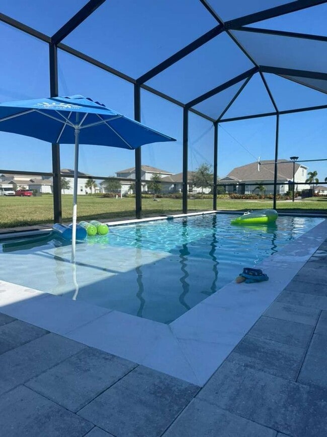 Building Photo - Modern 3-Bedroom Home with Pool and Lake View
