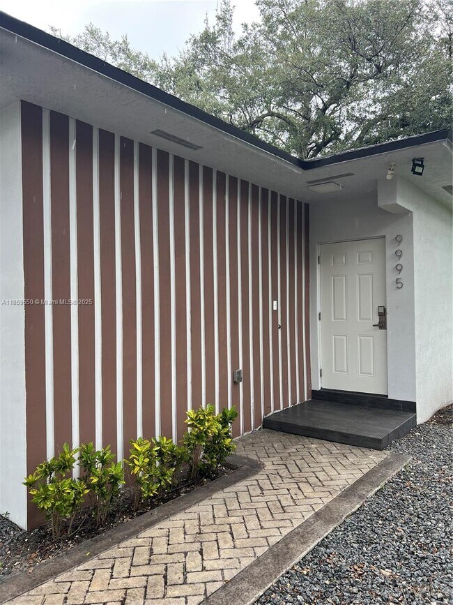 Building Photo - 9995 NW 23rd Ave