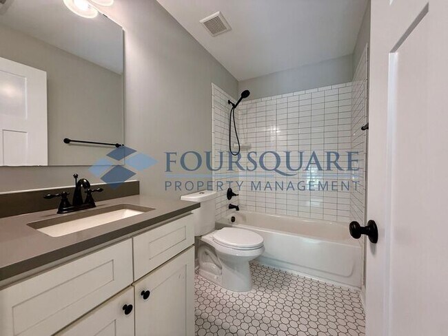 Building Photo - Modern 3-Bed / 2.5-Bath Home with Granite Kitchen, Fenced Yard & Private Balcony – Walkable to Do...