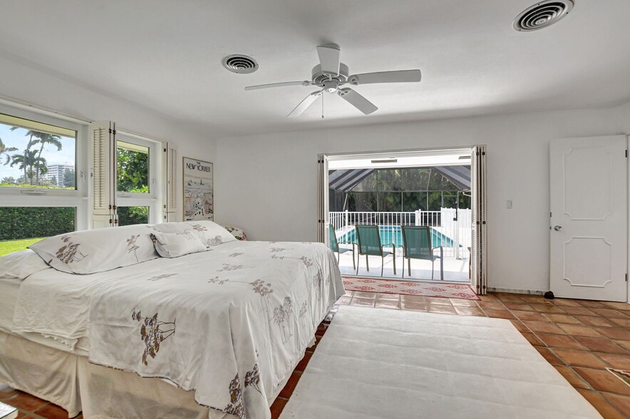 Master bedroom with view of patio - 1350 Spanish River Rd