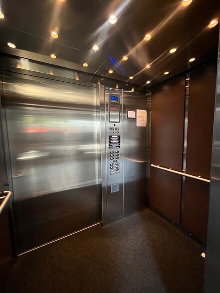 The elevator is huge; perfect for many groceries, large packages, furniture, and roof access. - 2910 Georgia Ave NW