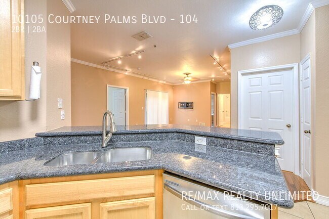 Building Photo - 10105 Courtney Palms Blvd
