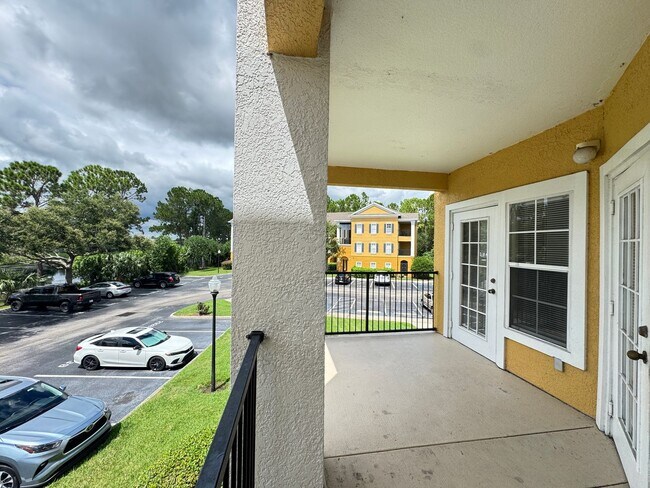 Building Photo - Gated Condo Next to The Mall At Millenia with Great Amenities