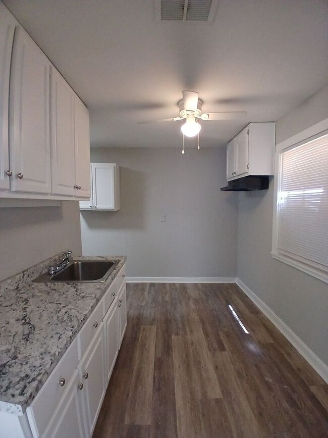 Building Photo - Renovated 3-Bedroom Gem on a Quiet Residential Street - Open To Section 8