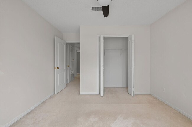 Building Photo - Spacious 3BR Retreat with Soaring Ceilings & Screened Porch