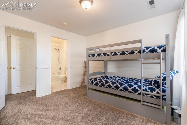 Building Photo - Maintenance free 2 bedroom, 2 full bath condo! Upper unit