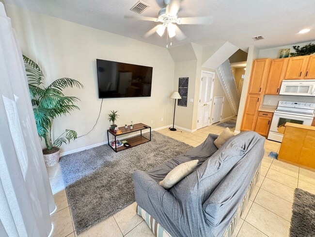 Building Photo - Fully Furnished 5-Bed End-Unit Townhome with Hot Tub in Gated Coral Cay! WASHER & DRYER INCLUDED!