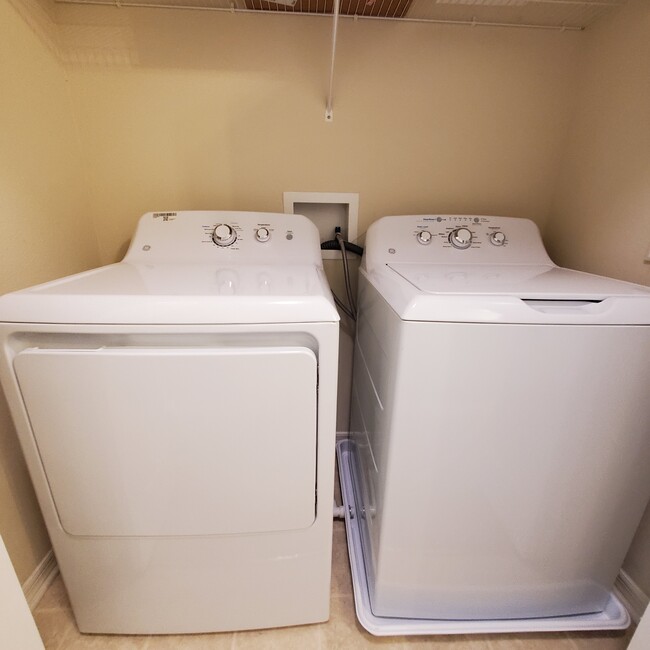 Hall laundry closet - 5808 Fishhawk Ridge Dr