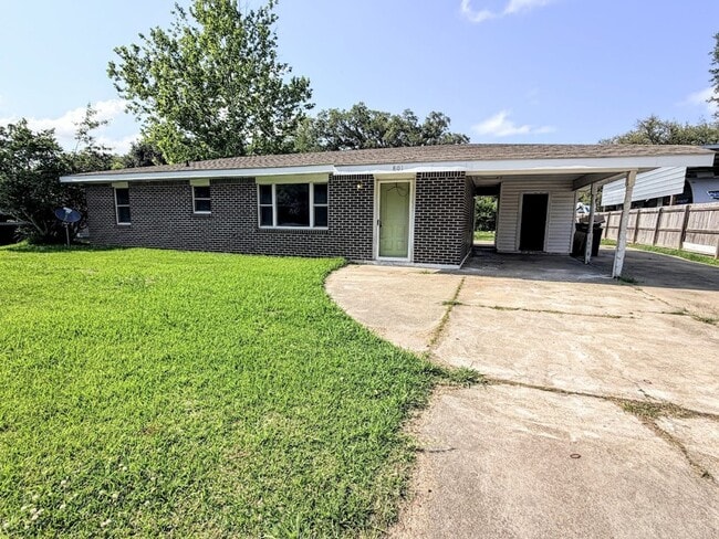 Building Photo - Affordable 3BR Brick Home with Carport