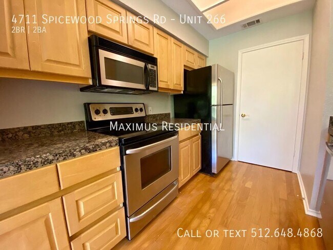 Building Photo - 4711 Spicewood Springs Rd