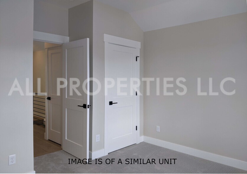 Building Photo - 8059 W 52nd Dr