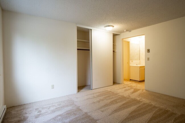 Building Photo - FREE RENT! Garden-Level 2 Bed 2 Bath with Large Patio, Parking, & W/D Hookups