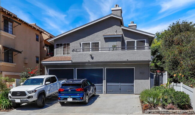 Building Photo - This quaint, gated complex is located on a...