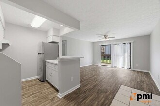 Building Photo - GATED COMMUNITY FULLY RENOVATED 1 BED 1 BATH WITH BALCONY AND POOL