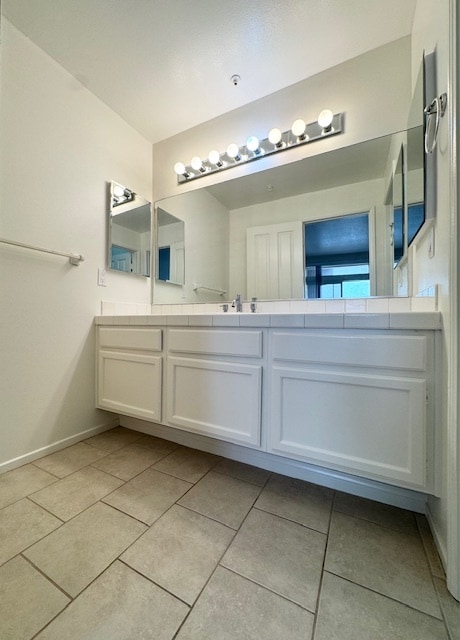 Primary ensuite bathroom vanity - 4581 Warner Ave