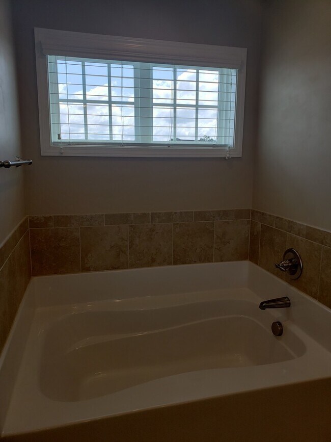 Building Photo - Practically New Home w/Fenced Back Yard Lo...