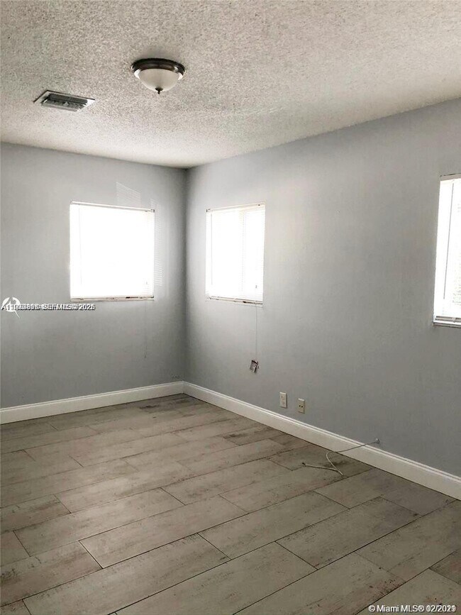 Building Photo - 1235 NE 3rd Ave