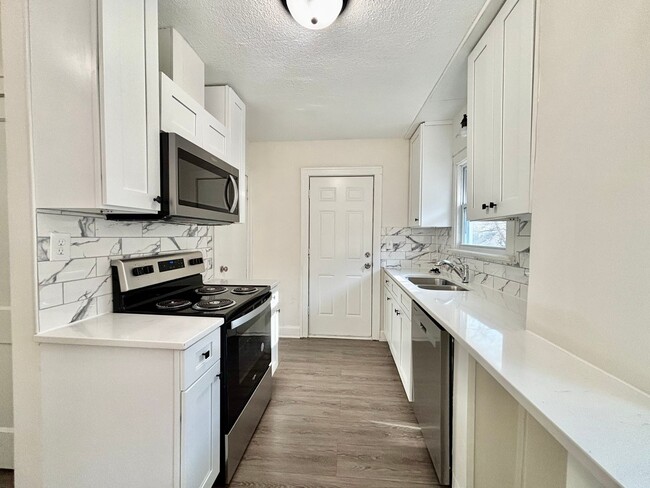 Building Photo - Fully Renovated 2-Bedroom Home with Back Deck, Basement & Off-Street Parking