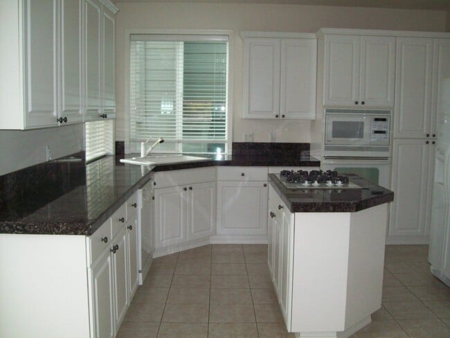 Building Photo - 12556 NW Brimpton Ct