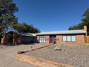 Building Photo - Welcome to Your New Home in NE Heights – Spacious, Stylish, and Full of Charm!