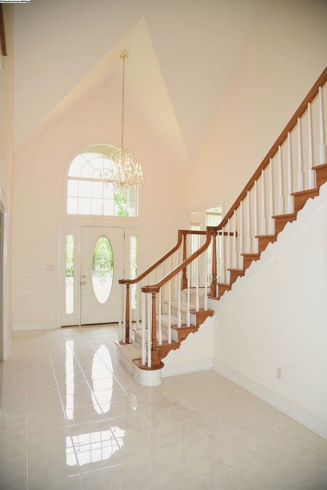 Building Photo - Executive Lakeview Home in Gated Windward Community!