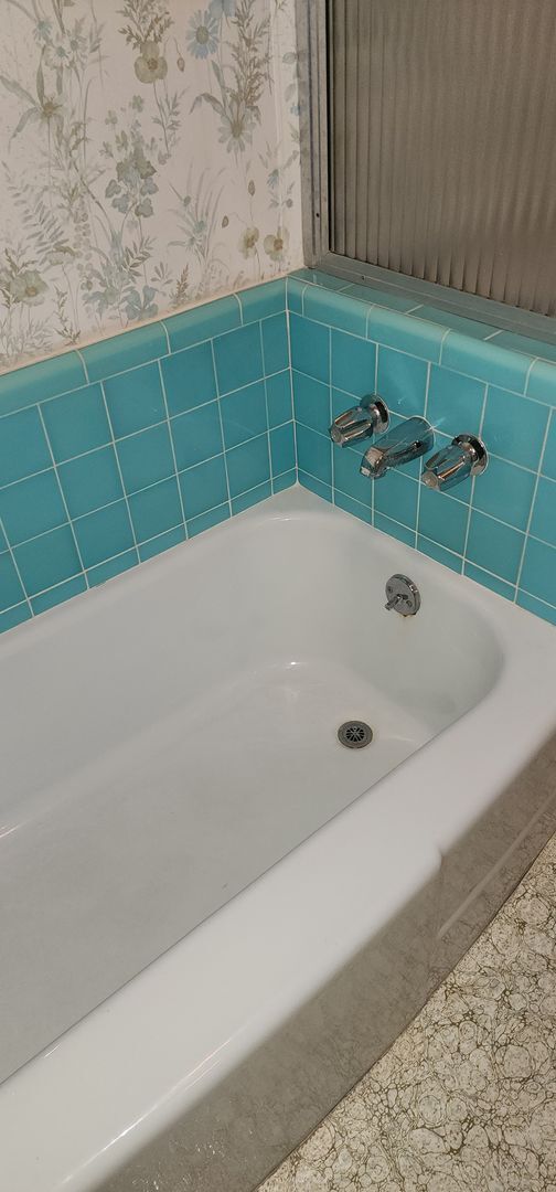 Building Photo - This is a spacious house featuring four bedrooms and two bathrooms, along with a two-car garage.