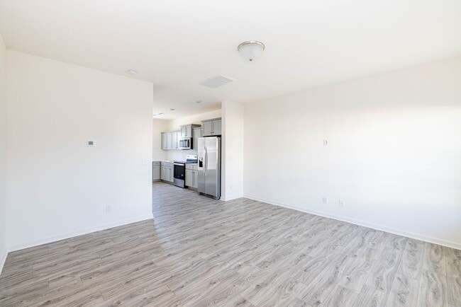 Building Photo - READY IN AUGUST 3 br 2.5 Townhome Near His...