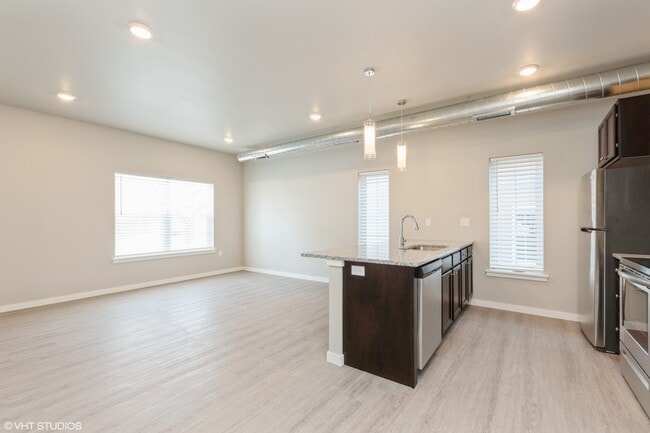 Building Photo - Villas at The Hub | Modern 3 Bedroom Townhome Garage & Private Entry