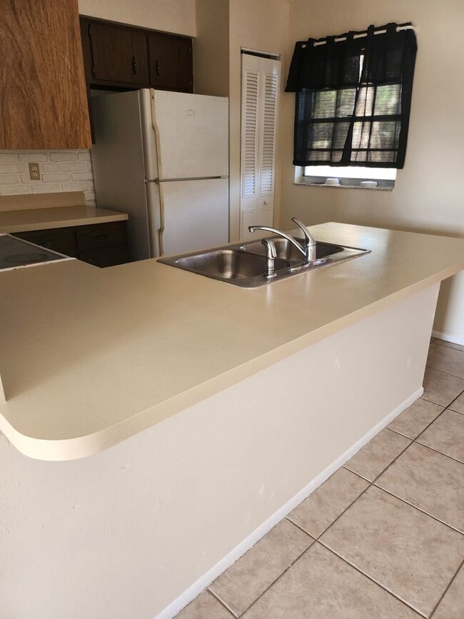 Building Photo - Cozy and Roomy! Nice corner lot home 2 Bedrooms 2 Baths with 1 car garage and huge backyard. Pets...