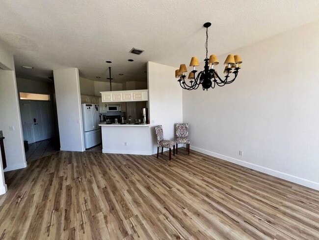 Building Photo - 3 Bedroom 2.5 Bath Cinnamon Bay Home with Stunning view, and Hardwood Flooring!