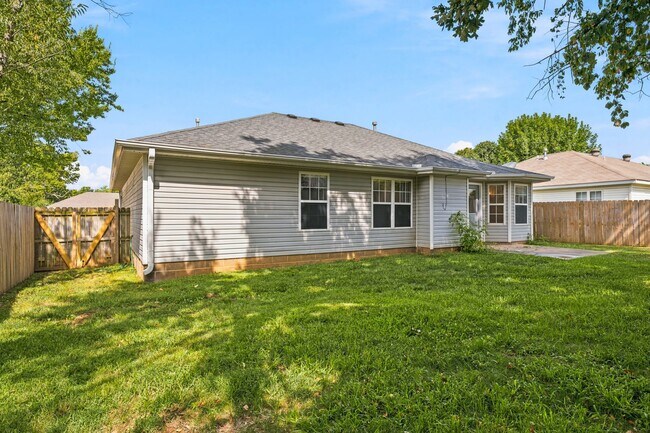 Building Photo - This beautiful ranch-style home