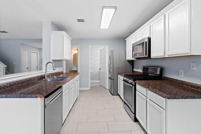 Building Photo - 6003 Wideleaf Dr