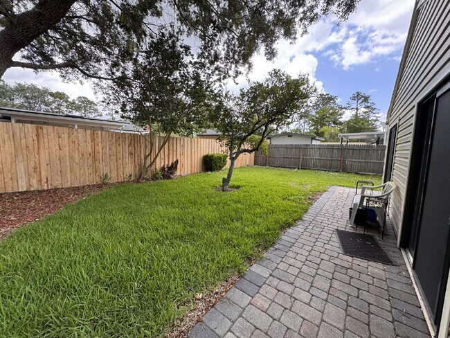 Building Photo - Updated Home with Spacious Backyard
