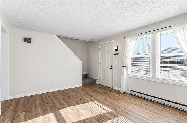 Building Photo - Spacious Layouts with Natural Light