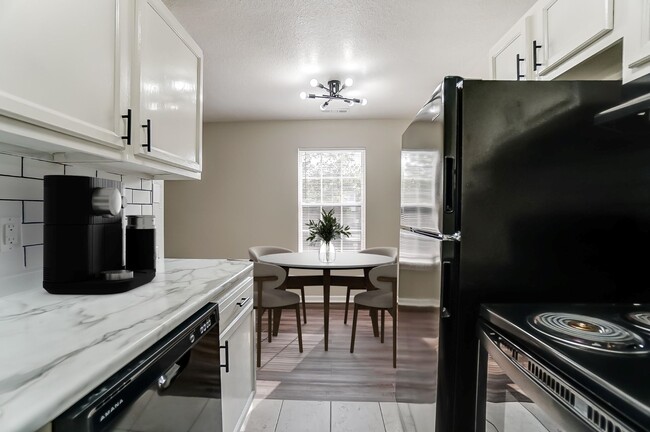 Building Photo - Renovated 3 Bedroom Available at Coral Clu...
