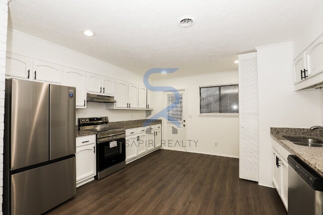 Building Photo - Move in before December 31st and choose your reward: a $250 Amazon Gift Card or a 55" Smart TV!