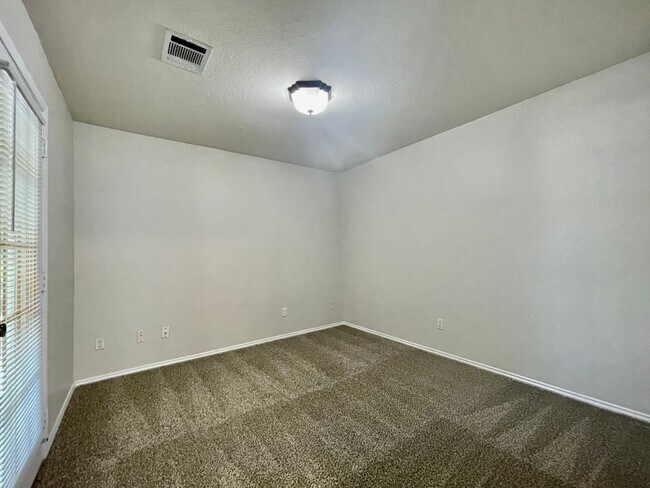 Building Photo - Spacious Home with Multiple Outdoor Living...