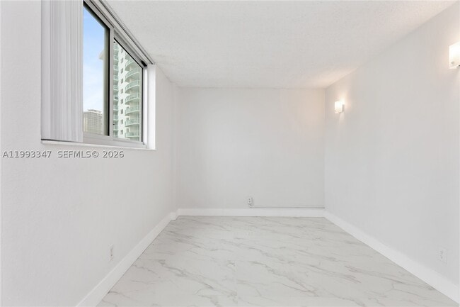 Building Photo - 19380 Collins Ave
