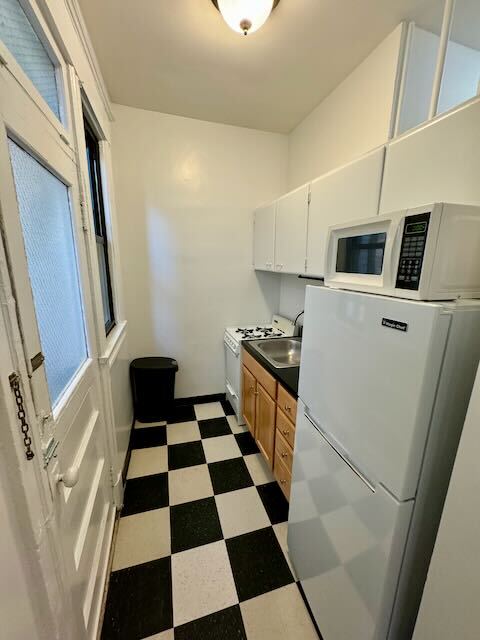216 203 kitchen - President Adams Building