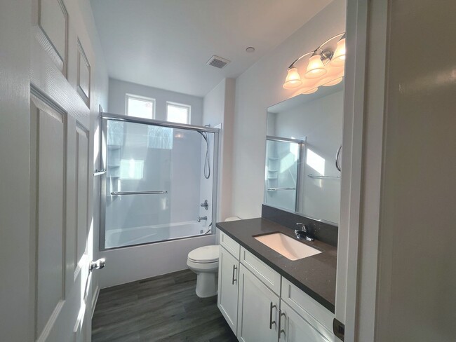 Building Photo - Single-story 1326 sq ft, townhome built in 2019 w/3 bed, 2 bath & spacious attached 2-car garage ...