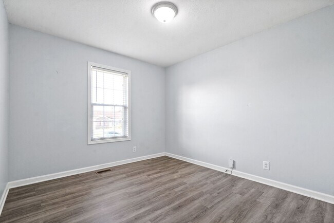 Building Photo - Adorable home with fenced back yard coming...