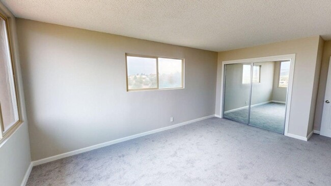 Building Photo - Updated Cochiti Lake Townhome with Views, Garage, Kiva Fireplace & Balcony