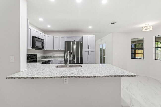 Building Photo - PENDING APPLICATION-Newly Renovated 3-Bedroom Home in Emerald Lake Colony – Move-In Special!