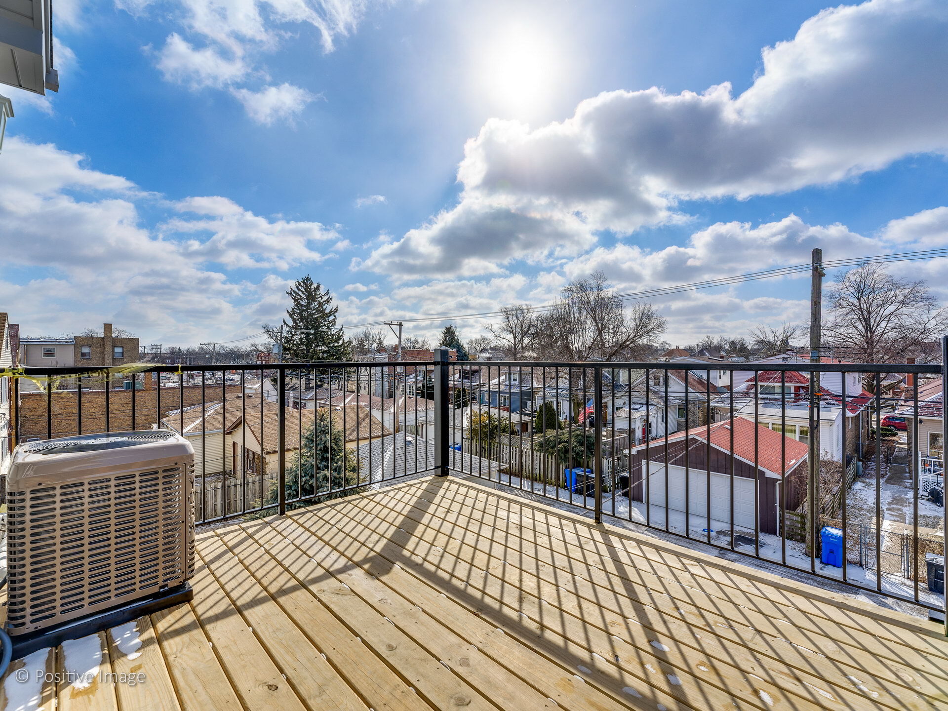 Photo of deck from top floor unit. 1st floor gets two private patios for grilling and furniture - 5306 W Devon Ave