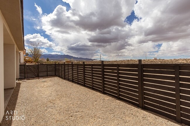 Building Photo - Beautiful, Brand-New 4 Bedroom Home in Scenic AZ