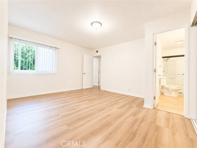 Building Photo - 10636 Woodley Ave