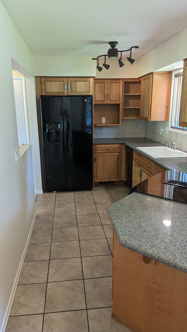 Building Photo - Spacious Three Bedroom with Large Backyard...